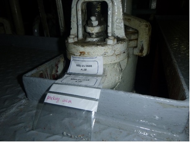 Asbestos gasket on a valve on board a ship 